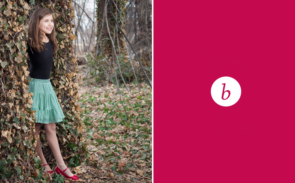 girl standing next to tree