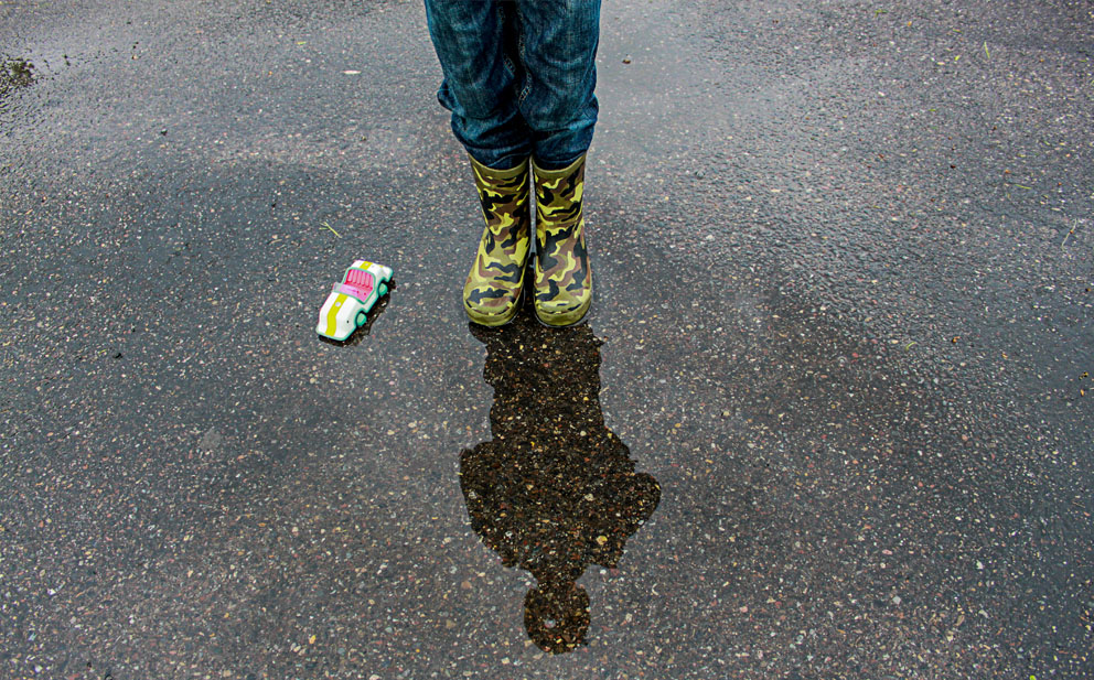 boots in water puddle